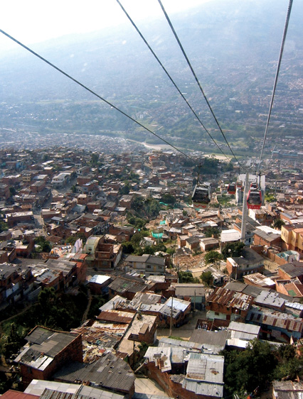 Cable cars traversing a new Medellín Metro line.