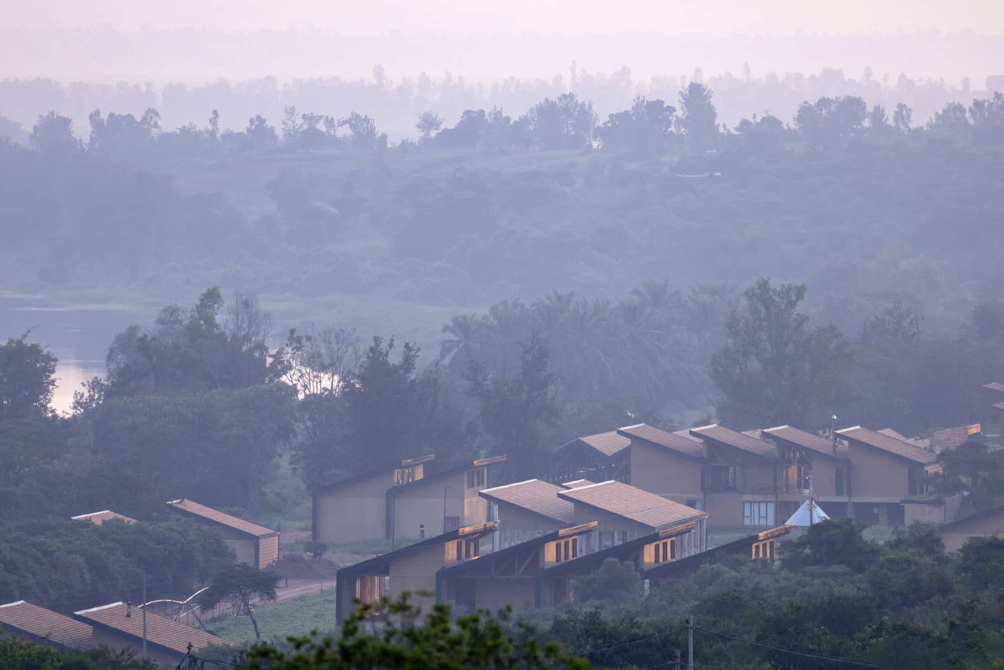 Exterior of RICA campus at sunset.
